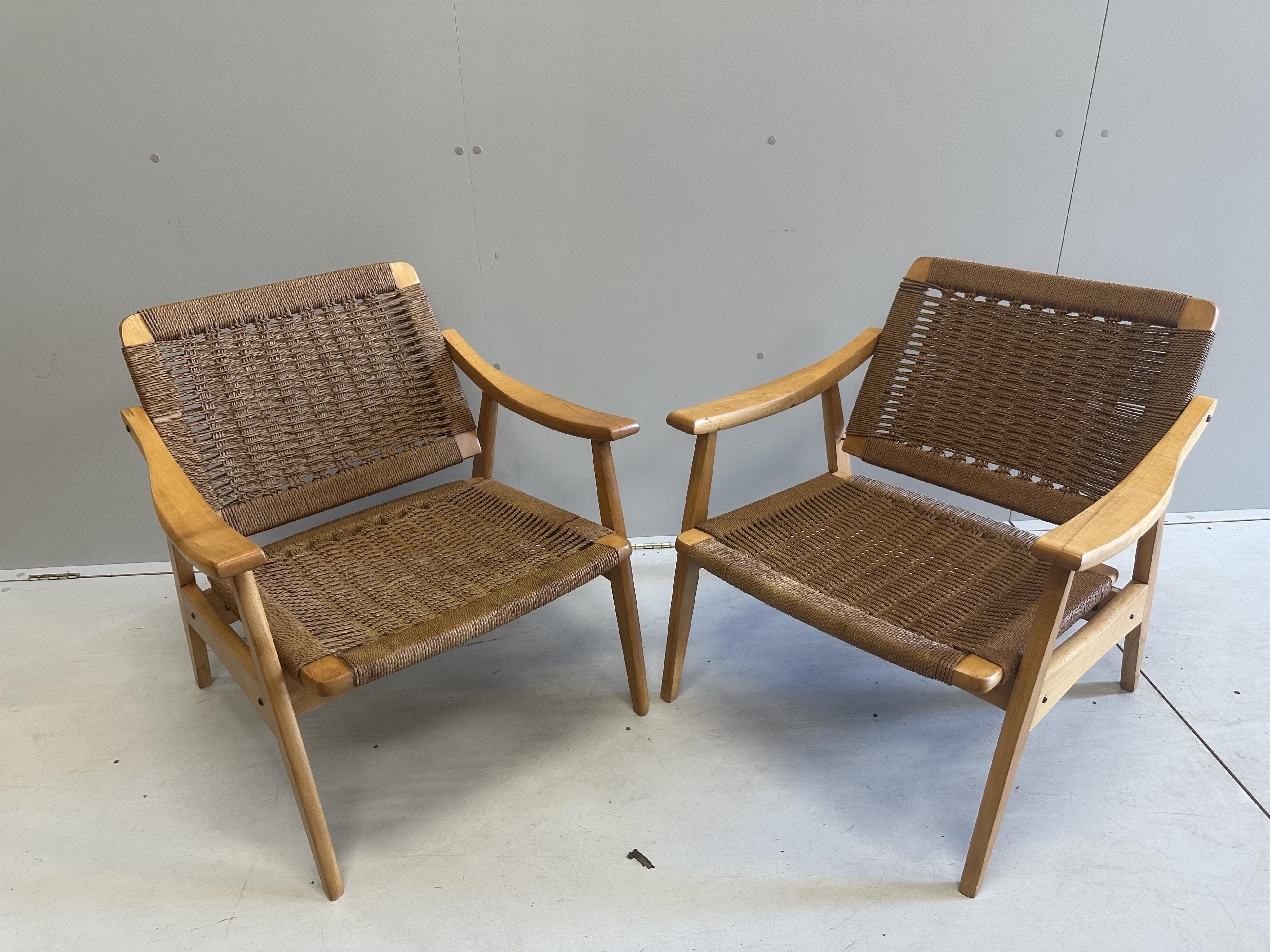 A mid century caned teak three piece lounge suite, settee width 174cm, depth 68cm, height 71cm. Condition - good